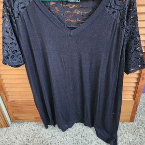 Heimish black top with lace sleeves